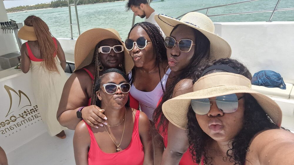 Friends celebrating on a catamaran cruise in Punta Cana